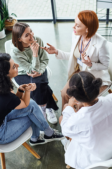 People participate in group therapy at a behavioral health center.