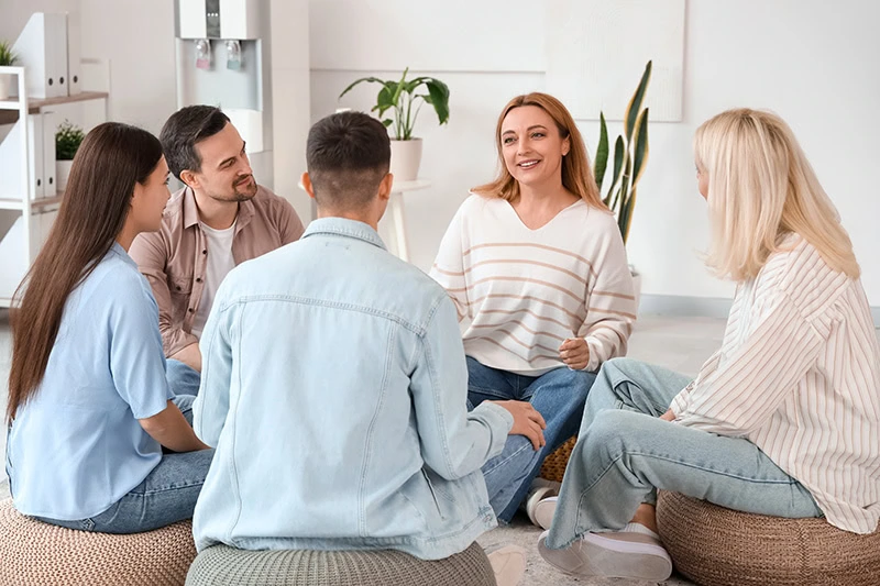 People participate in therapy at a fentanyl addiction treatment center.