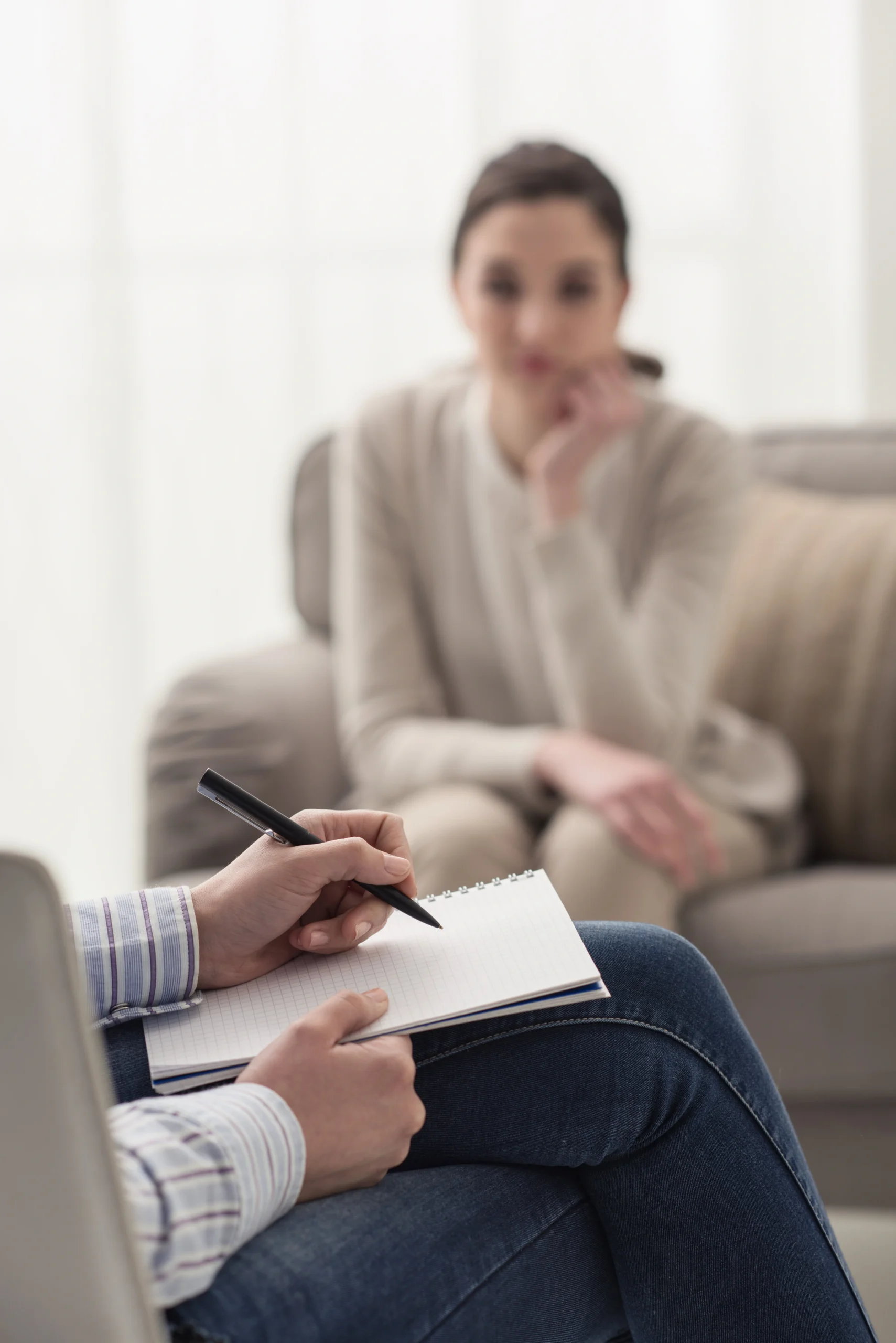 A person participates in therapy at a drug rehab center.